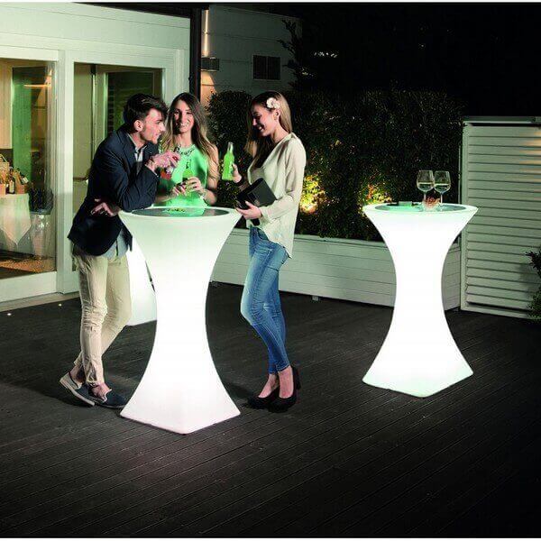 Club high table bar for events by night. Light furnitures and led table for party