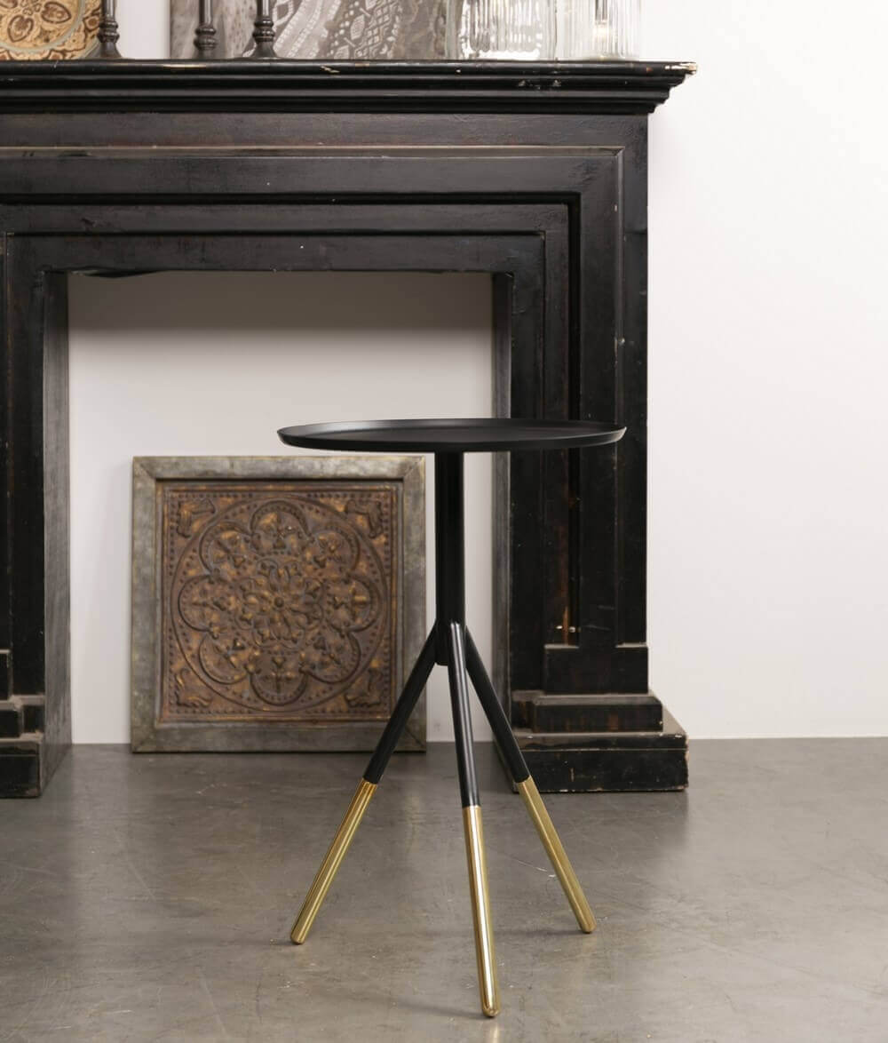 Table in black iron and brass